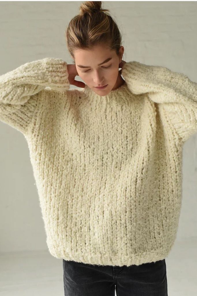 Cozy oversized cream-colored sweater.