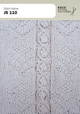A central line of raised bobbles is framed by twisting cables for a classic textured design. White yarn swatch showing JS 110 stitch with raised bobbles and twisting cable columns.
