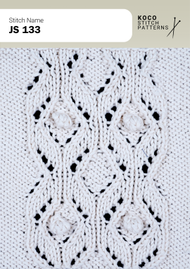 Small bobbles framed by cable and lace details create a charming textured pattern. White yarn swatch showing JS 133 stitch with bobble motifs, cables, and lace eyelets.