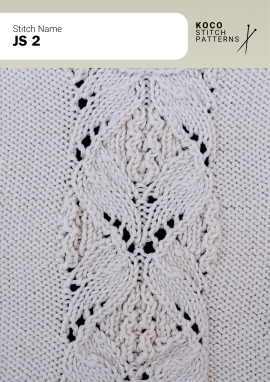 A central leaf-shaped cable motif brings graceful movement and airy lace detail to handknit fabric. Close up of the JS 2 handknit stitch pattern in white yarn, showing an elongated leaf-shaped cable motif with surrounding eyelet lace and textured knit stitches.