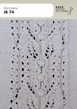 Central bobble details and flowing cables add depth and sculptural texture to handknit fabric Close-up of the JS 74 handknit stitch pattern in white yarn, showing raised bobble details, vertical cable columns, and eyelet lace openings