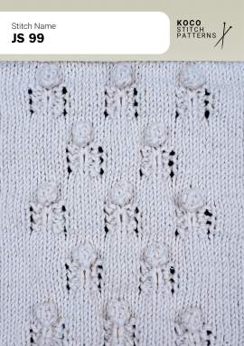 Raised bobble flowers sit between delicate lace columns for a playful dimensional texture. White yarn swatch showing JS 99 stitch with raised bobble flowers and vertical lace columns.
